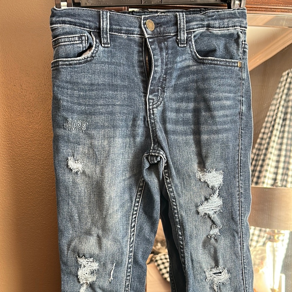 Distressed Blue Denim Jeans
